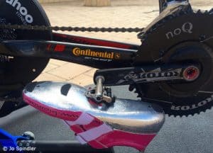 Bicycle chain and gear system close-up.