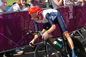 Triathlete cyclist at race event.
