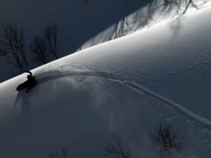 skiing down the snow