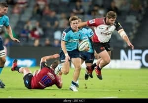 Rugby players in action during match.
