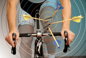 Cyclist with target and arrows for focus.