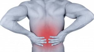 Person with lower back pain in red.