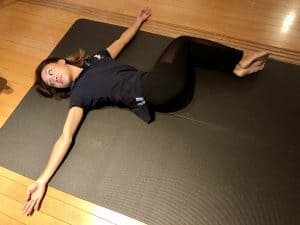 Woman performing a stretching exercise.