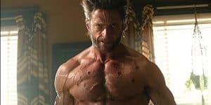 Man with muscular chest at home.