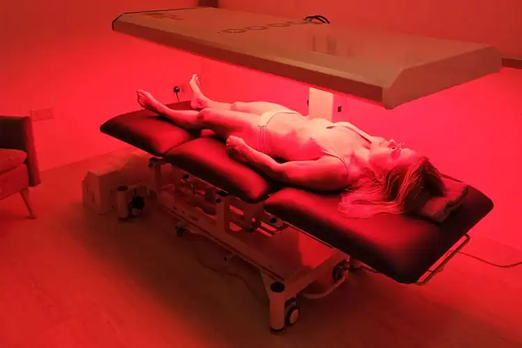 Patient receiving red light therapy at a.